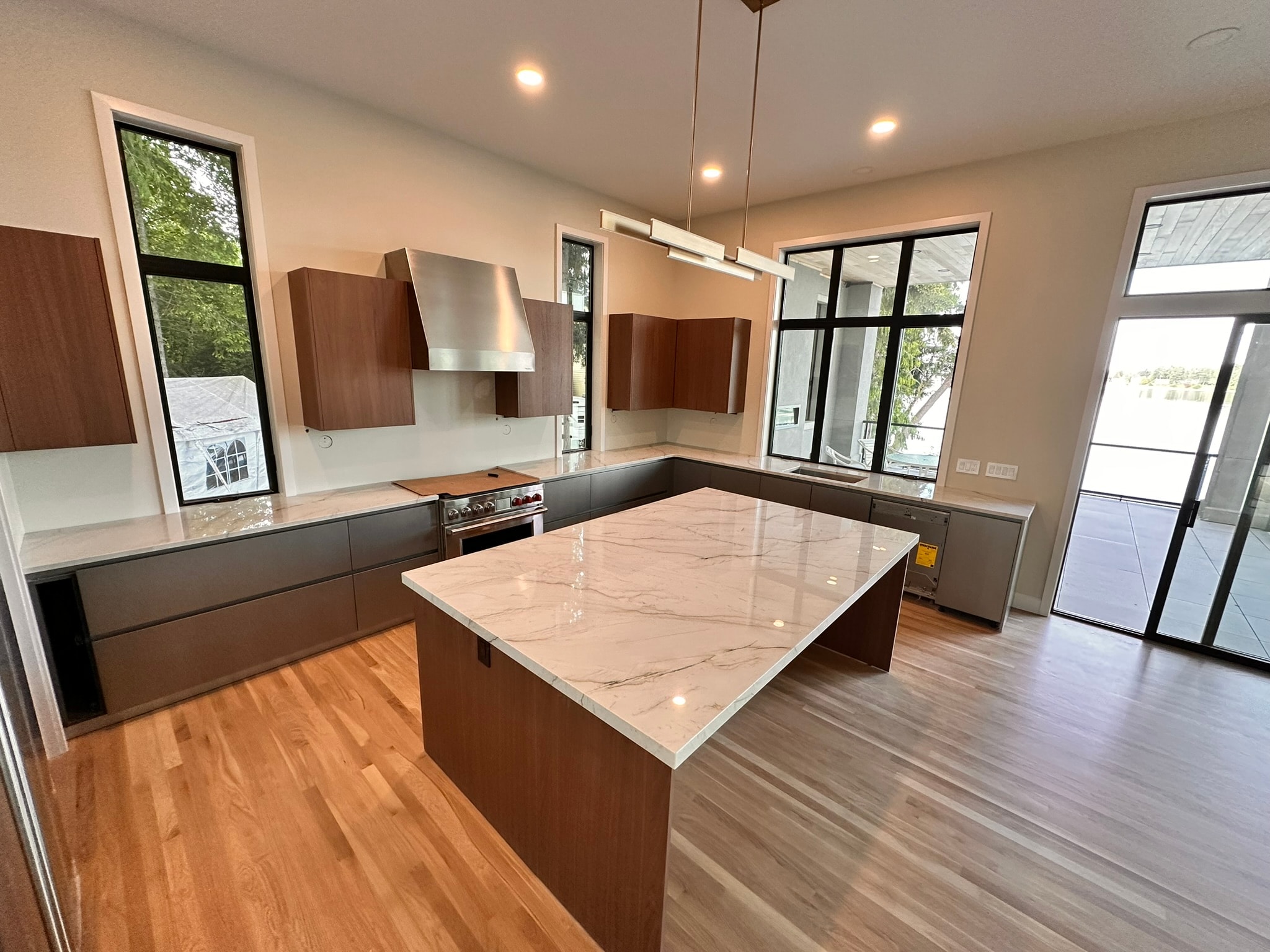 Modern kitchen with marble island countertop